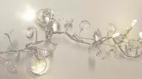 Kralen guirlande transparant 20 LED lampjes 120cm